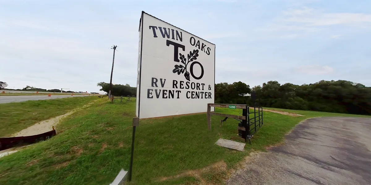 The Twin Oaks roadside sign on Interstate 10